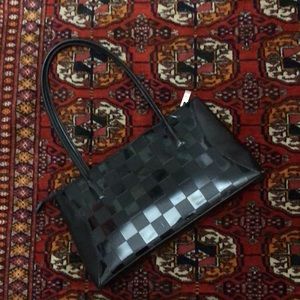 Beautiful black evening/day bag with inside pockets. Full zipper